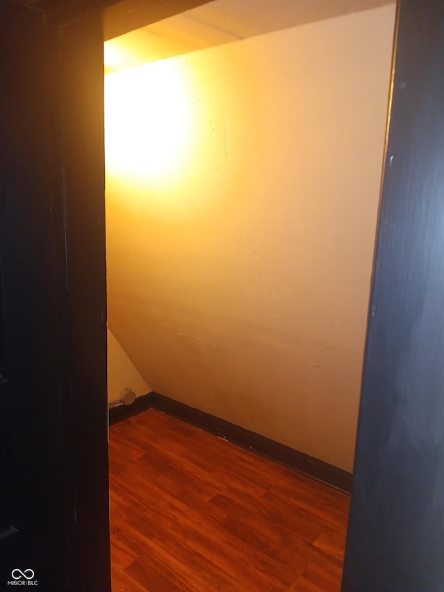 empty room with wood finished floors