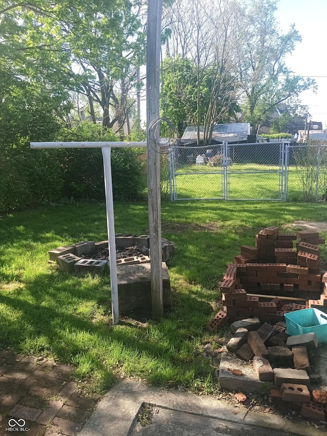 view of yard with a gate and fence