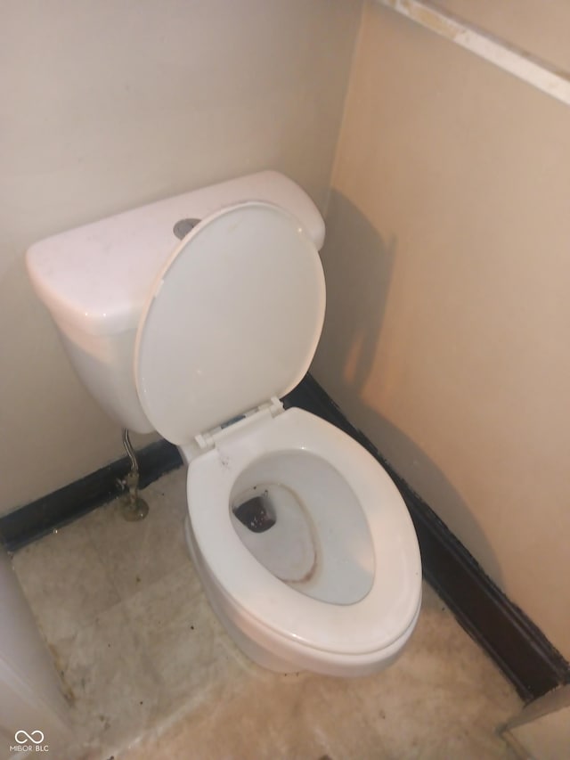 bathroom featuring toilet