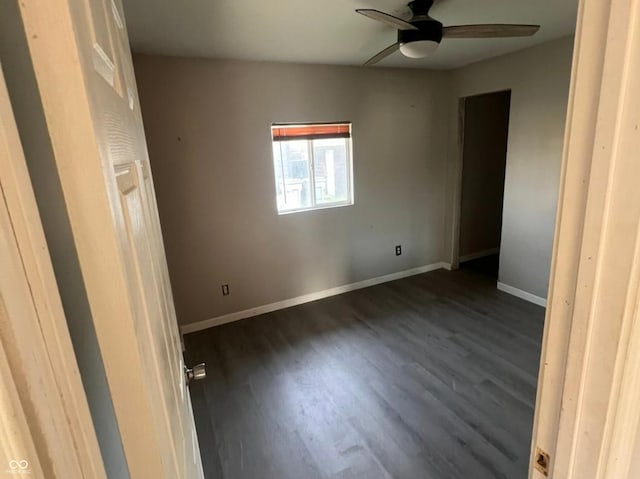 3031 E 38th St, Indianapolis, IN 46218 - unfurnished room featuring dark wood finished floors and a ceiling fan
