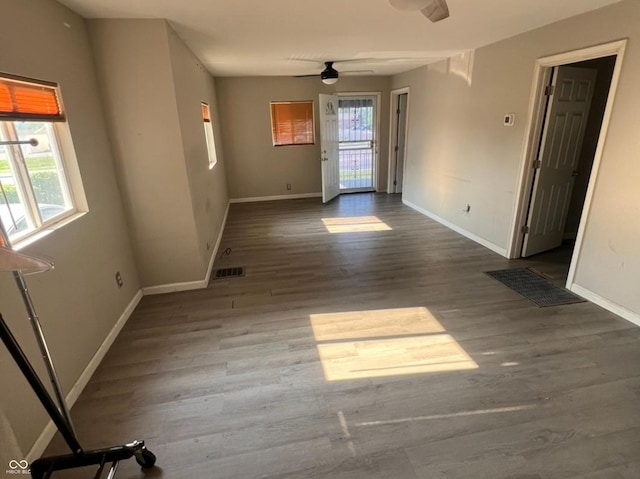 3031 E 38th St, Indianapolis, IN 46218 - unfurnished room with plenty of natural light, ceiling fan, and wood finished floors