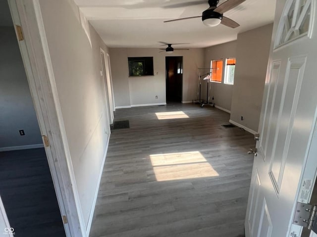 3031 E 38th St, Indianapolis, IN 46218 - empty room with a ceiling fan and wood finished floors