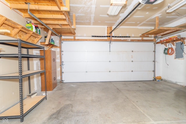 2761 Winding Creek Ln, Greenfield, IN 46140 - garage with electric panel and a garage door opener