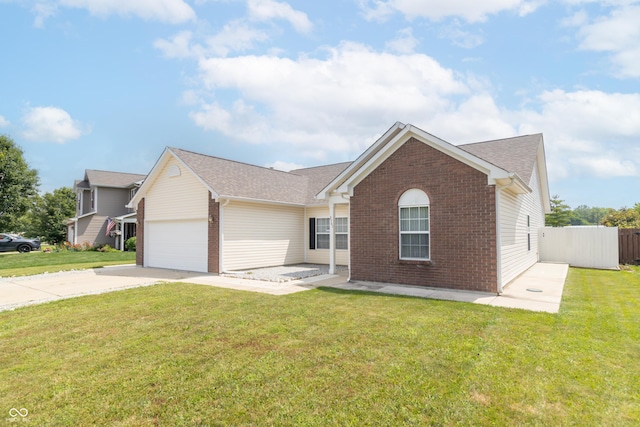 2761 Winding Creek Ln, Greenfield, IN 46140 - ranch-style home featuring brick siding, a garage, and driveway