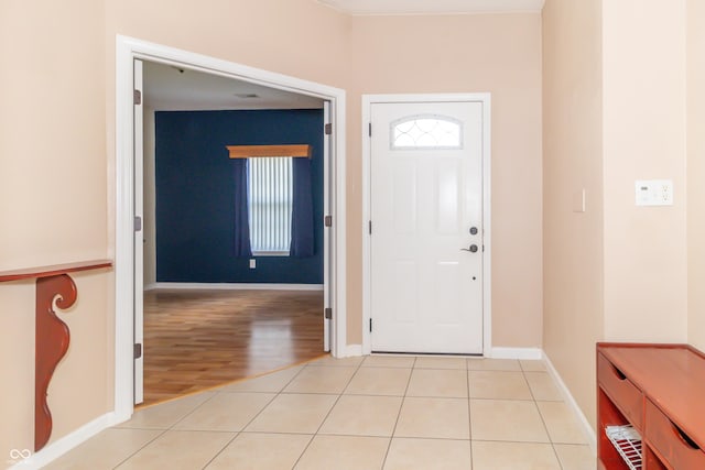 2761 Winding Creek Ln, Greenfield, IN 46140 - foyer entrance with baseboards and light wood finished floors