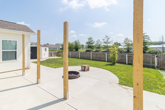 2761 Winding Creek Ln, Greenfield, IN 46140 - fenced backyard with a storage unit and a patio area