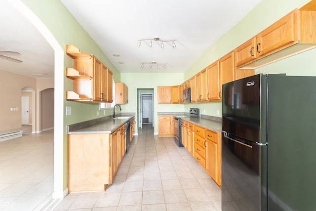2761 Winding Creek Ln, Greenfield, IN 46140 - kitchen featuring black appliances, arched walkways, light tile patterned floors, open shelves, and light brown cabinets