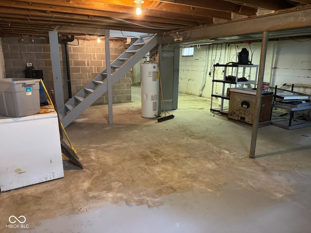 unfinished below grade area with water heater and stairs