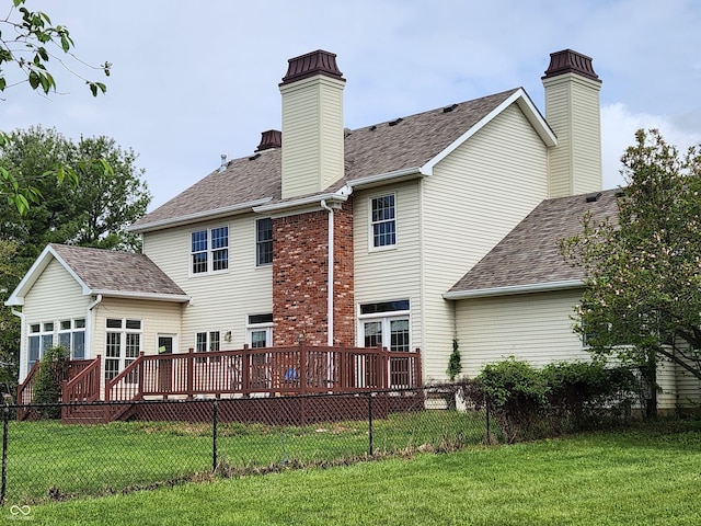 9909 E Mcgregor Rd, Indianapolis, IN 46259 - rear view of house with a wooden deck, a chimney, and roof with shingles