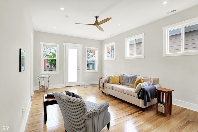 829 Olive St, Indianapolis, IN 46203 - living area with ceiling fan, light wood-style flooring, baseboards, and recessed lighting