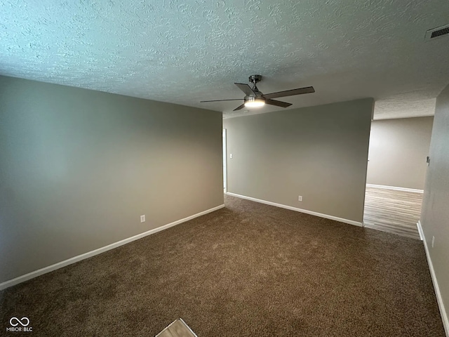 2453 Larnie Ln, Indianapolis, IN 46219 - spare room featuring a ceiling fan, a textured ceiling, and carpet flooring