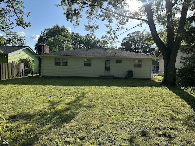 2453 Larnie Ln, Indianapolis, IN 46219 - back of property with a chimney and entry steps