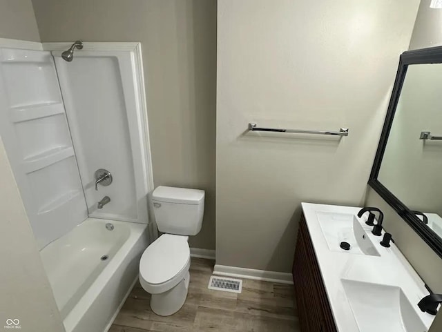 2453 Larnie Ln, Indianapolis, IN 46219 - bathroom with wood finished floors, vanity, and bathtub / shower combination