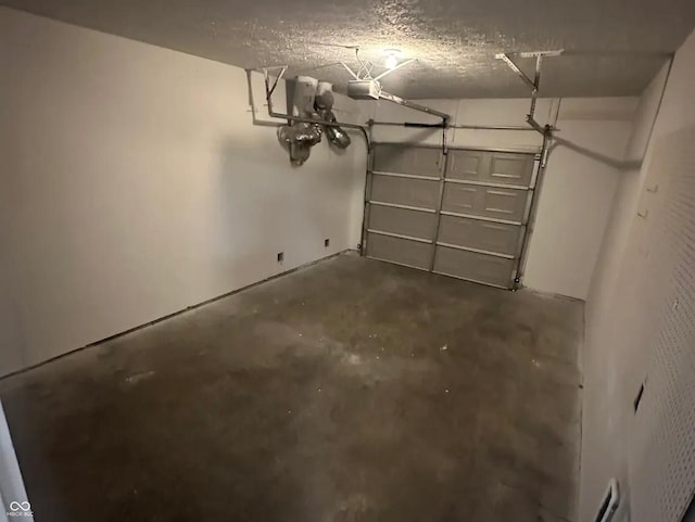 2453 Larnie Ln, Indianapolis, IN 46219 - garage featuring a garage door opener