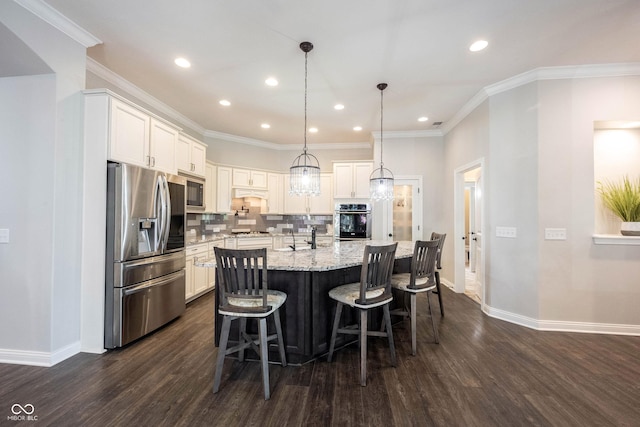 kitchen with stainless steel appliances, baseboards, dark wood finished floors, tasteful backsplash, and white cabinetry