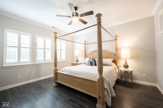 bedroom featuring baseboards, crown molding, wood finished floors, and a ceiling fan