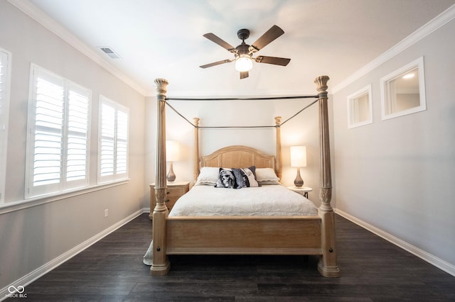 bedroom with crown molding, wood finished floors, baseboards, and a ceiling fan