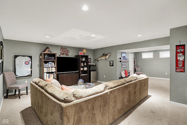 living area with light carpet, baseboards, and recessed lighting