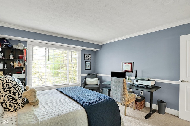 bedroom with crown molding, carpet flooring, baseboards, and a textured ceiling