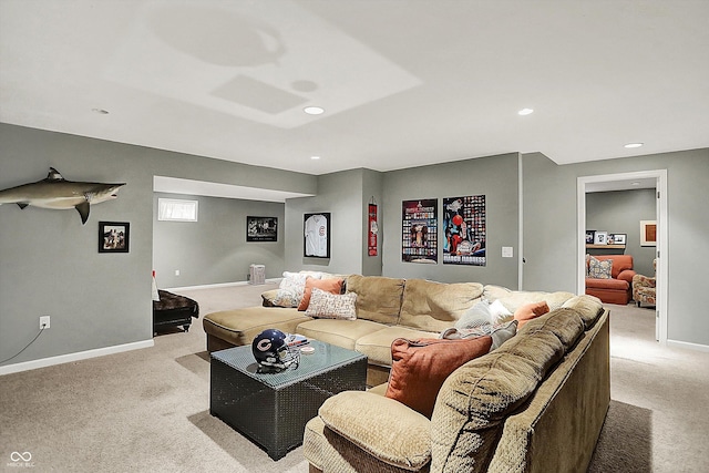 living area featuring light colored carpet, baseboards, and recessed lighting