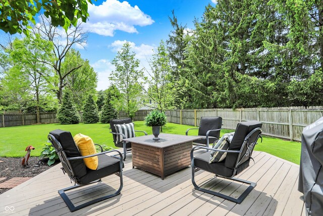 wooden terrace featuring an outdoor living space