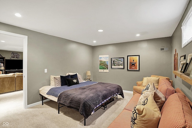 bedroom with light carpet, recessed lighting, and baseboards