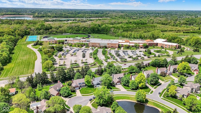 bird's eye view of a forest and a nearby body of water