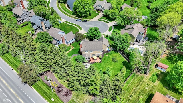 aerial overview of property's location featuring nearby suburban area