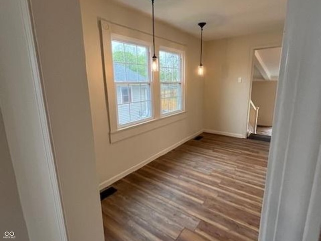 223 E Fordice St, Lebanon, IN 46052 - unfurnished dining area with baseboards and wood finished floors