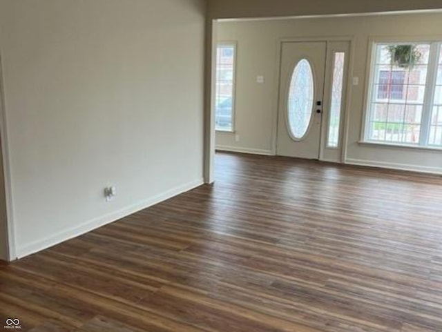 223 E Fordice St, Lebanon, IN 46052 - entryway featuring baseboards and dark wood finished floors