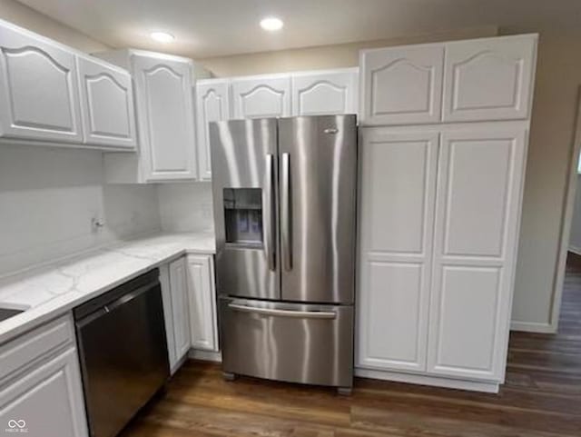 223 E Fordice St, Lebanon, IN 46052 - kitchen featuring light stone countertops, dishwasher, white cabinetry, stainless steel fridge with ice dispenser, and dark wood-style floors