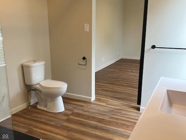 223 E Fordice St, Lebanon, IN 46052 - full bath featuring toilet, wood finished floors, and baseboards