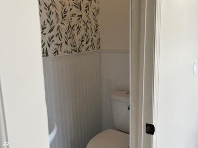 223 E Fordice St, Lebanon, IN 46052 - bathroom with toilet and a wainscoted wall