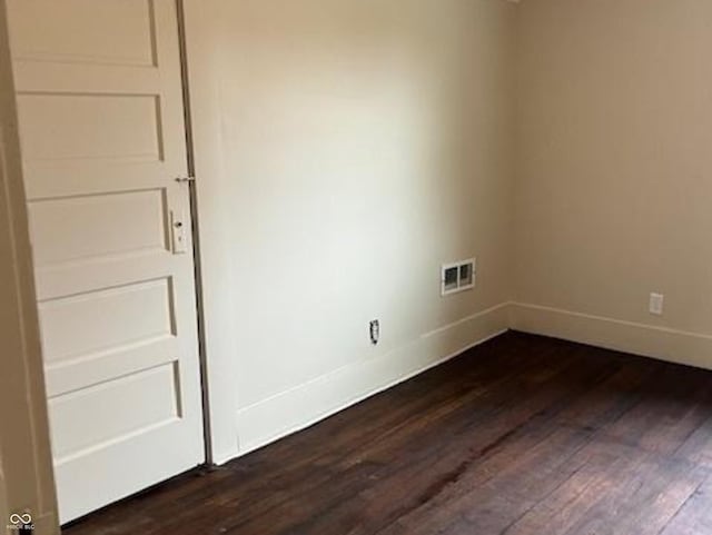 223 E Fordice St, Lebanon, IN 46052 - empty room with dark wood-style flooring, baseboards, and visible vents
