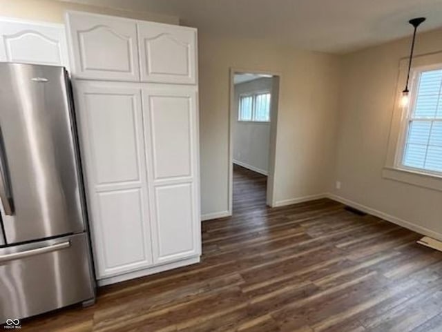 223 E Fordice St, Lebanon, IN 46052 - kitchen with freestanding refrigerator, pendant lighting, white cabinets, dark wood finished floors, and baseboards