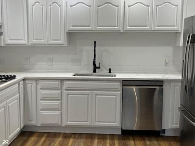 223 E Fordice St, Lebanon, IN 46052 - kitchen with a sink, light countertops, white cabinets, and appliances with stainless steel finishes