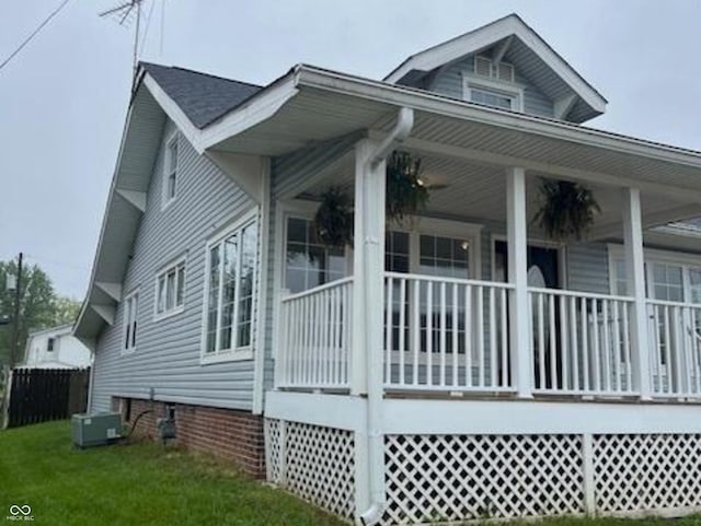 223 E Fordice St, Lebanon, IN 46052 - view of property exterior with central AC unit, a yard, and covered porch