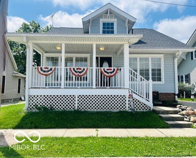 223 E Fordice St, Lebanon, IN 46052 - bungalow-style house with a porch and roof with shingles