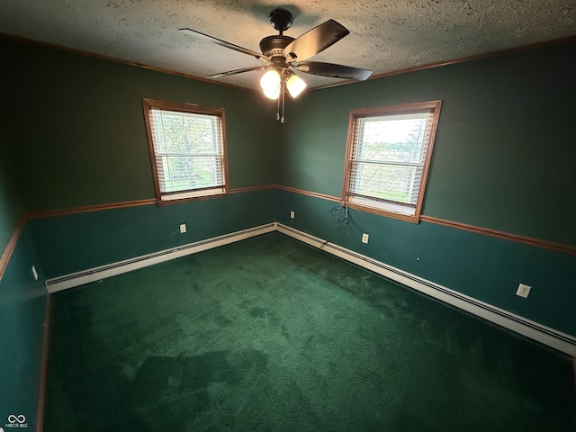 7140 N Michigan Rd, Fairland, IN 46126 - spare room with healthy amount of natural light, carpet floors, a ceiling fan, a textured ceiling, and baseboards