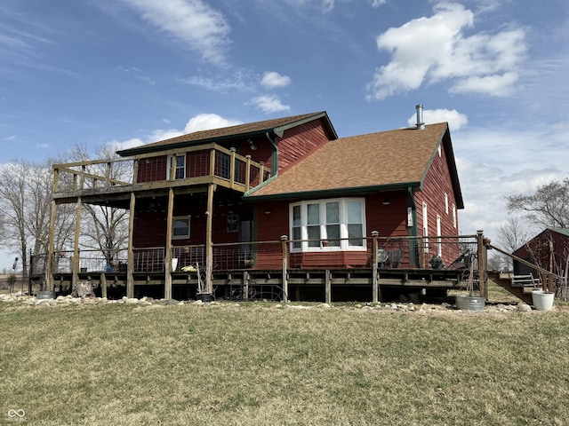 7140 N Michigan Rd, Fairland, IN 46126 - rear view of house with a lawn, a shingled roof, and a deck