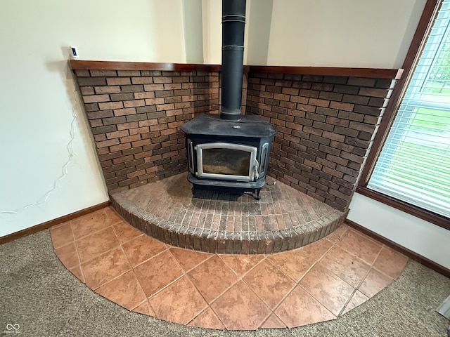 7140 N Michigan Rd, Fairland, IN 46126 - detailed view of baseboards and a wood stove