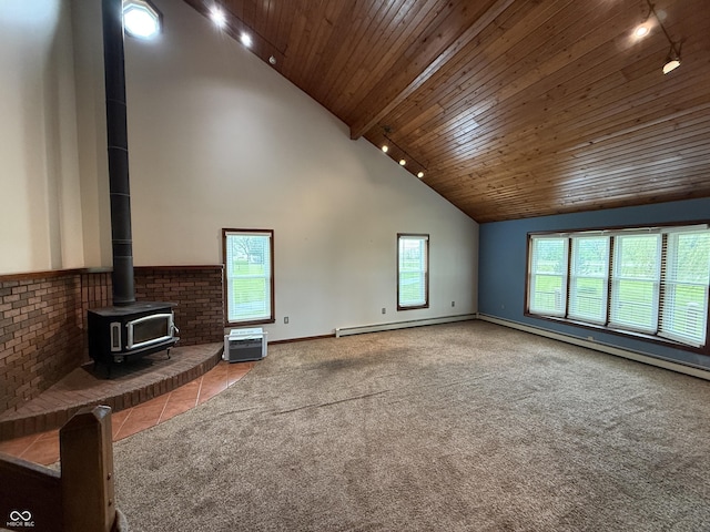 7140 N Michigan Rd, Fairland, IN 46126 - unfurnished living room featuring rail lighting, wooden ceiling, a wood stove, high vaulted ceiling, and carpet flooring