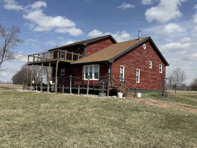 7140 N Michigan Rd, Fairland, IN 46126 - back of property featuring a yard, a shingled roof, a balcony, and a deck