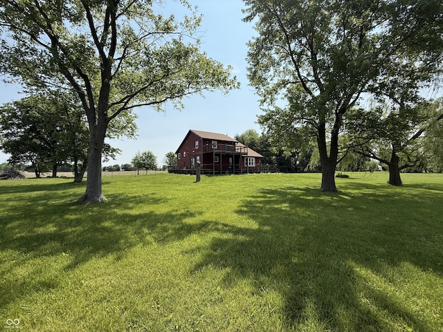 7140 N Michigan Rd, Fairland, IN 46126 - view of grassy yard featuring a barn and an outbuilding