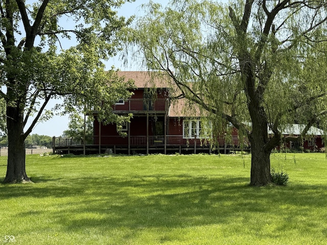 7140 N Michigan Rd, Fairland, IN 46126 - view of green lawn with a deck