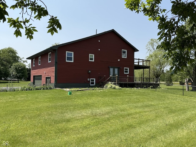 7140 N Michigan Rd, Fairland, IN 46126 - rear view of property featuring an attached garage and a deck