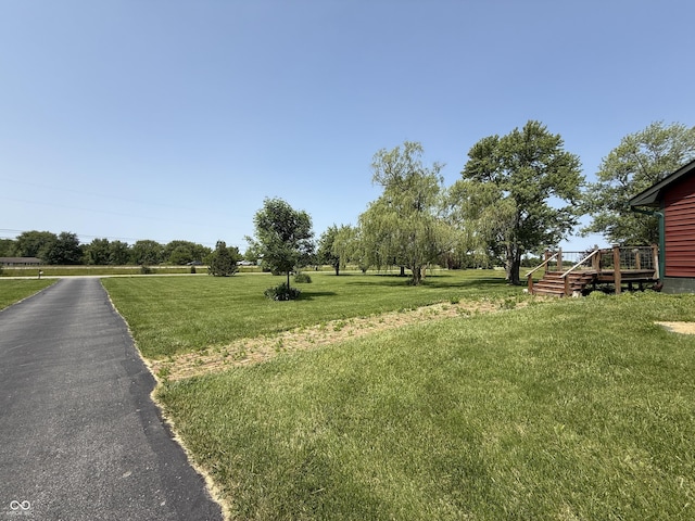 7140 N Michigan Rd, Fairland, IN 46126 - view of grassy yard featuring a deck