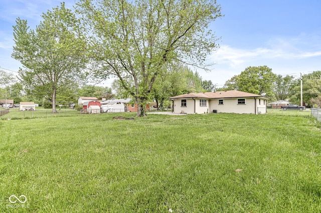 view of yard with fence
