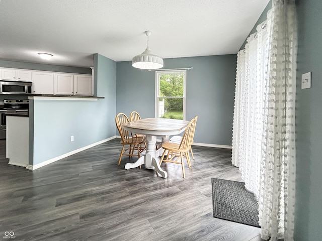 625 Streamside Dr, Greenfield, IN 46140 - dining area with baseboards and dark wood-style flooring