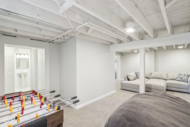 interior space with carpet floors and baseboards